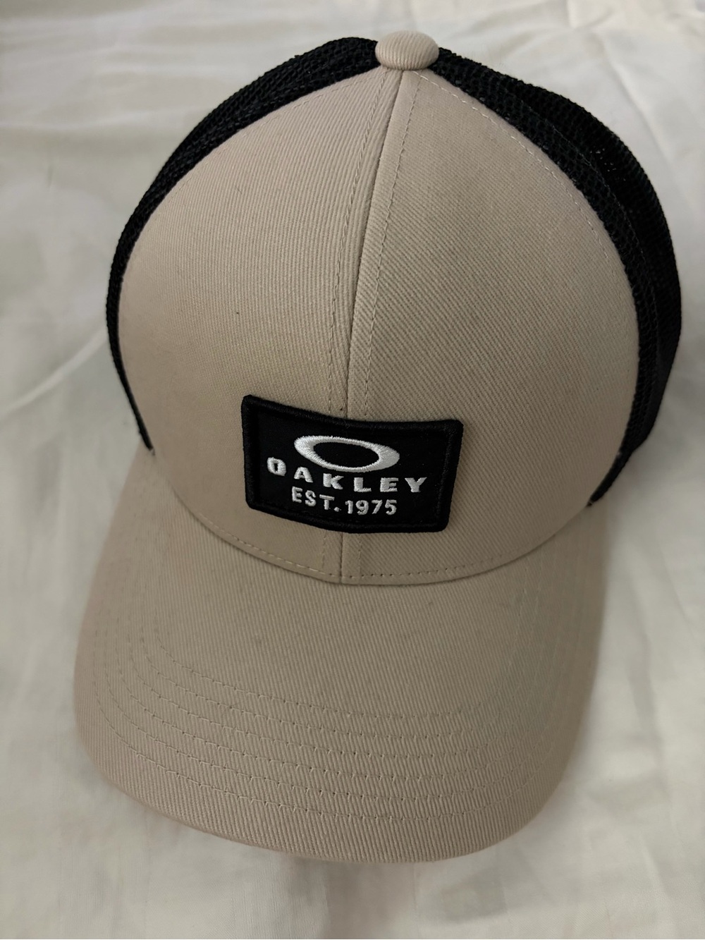 Oakley Beige Front Black Mesh Trucker Hat